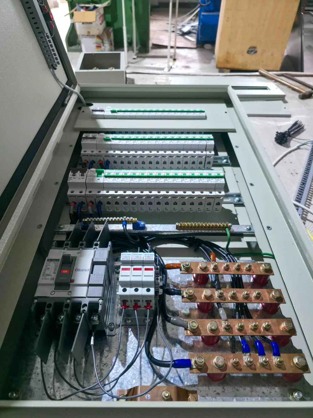 Breakers and copper busbars inside a distribution assembly